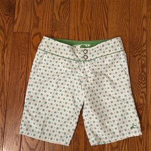 Oriel women’s surfer board shorts Guc size 0. White and green